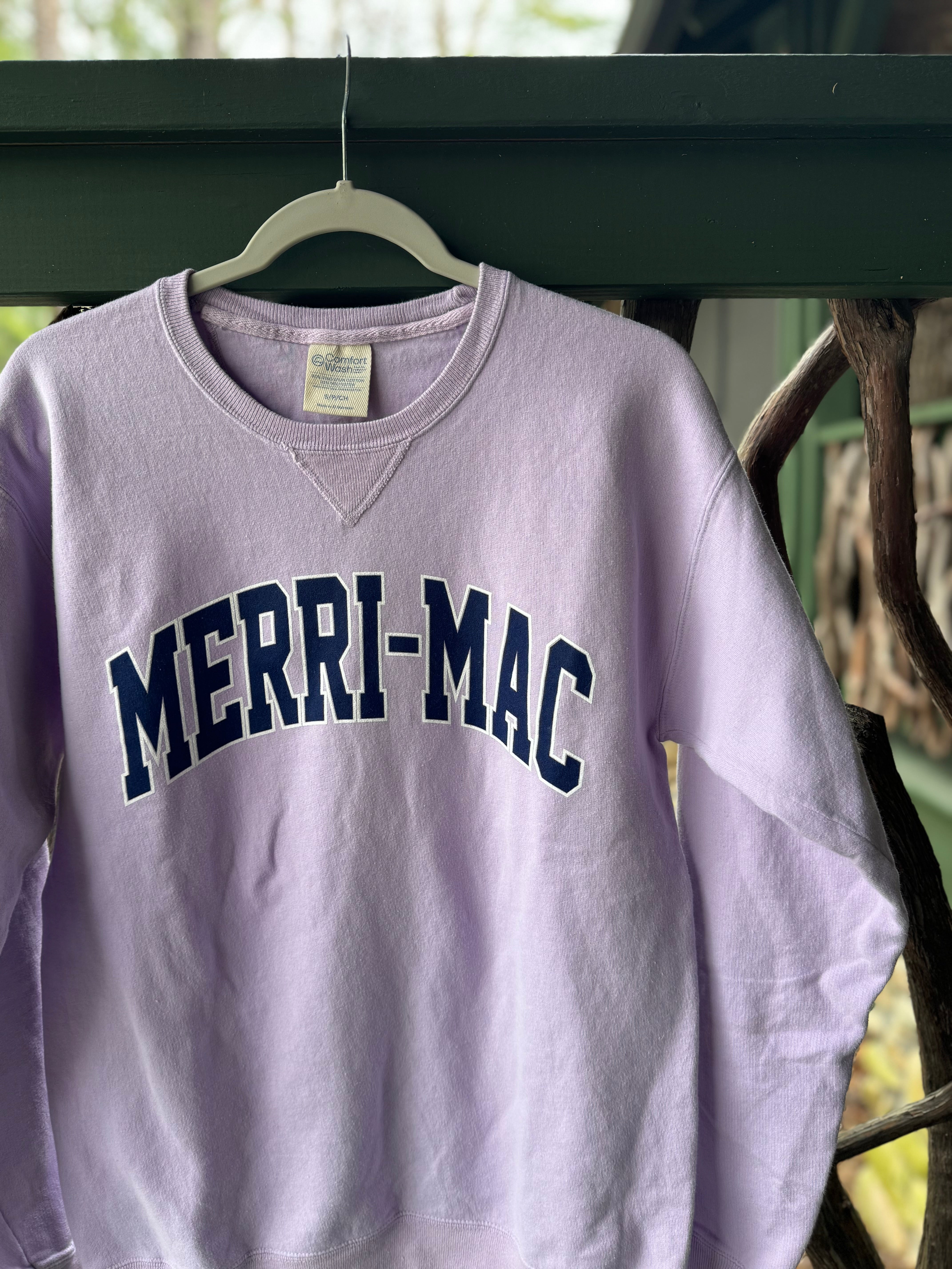 Lilac crewneck sweatshirt with "Merri-Mac" printed across the front in navy lettering.